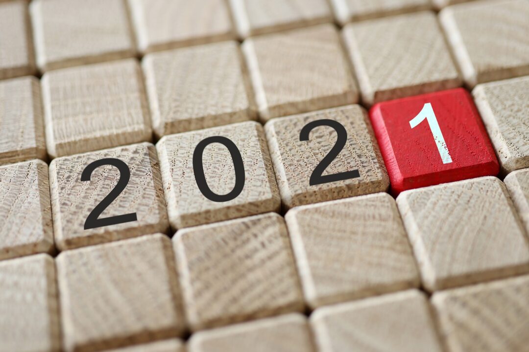 Set Of Wooden Blocks In Strict Order With 2021 Sign On Them