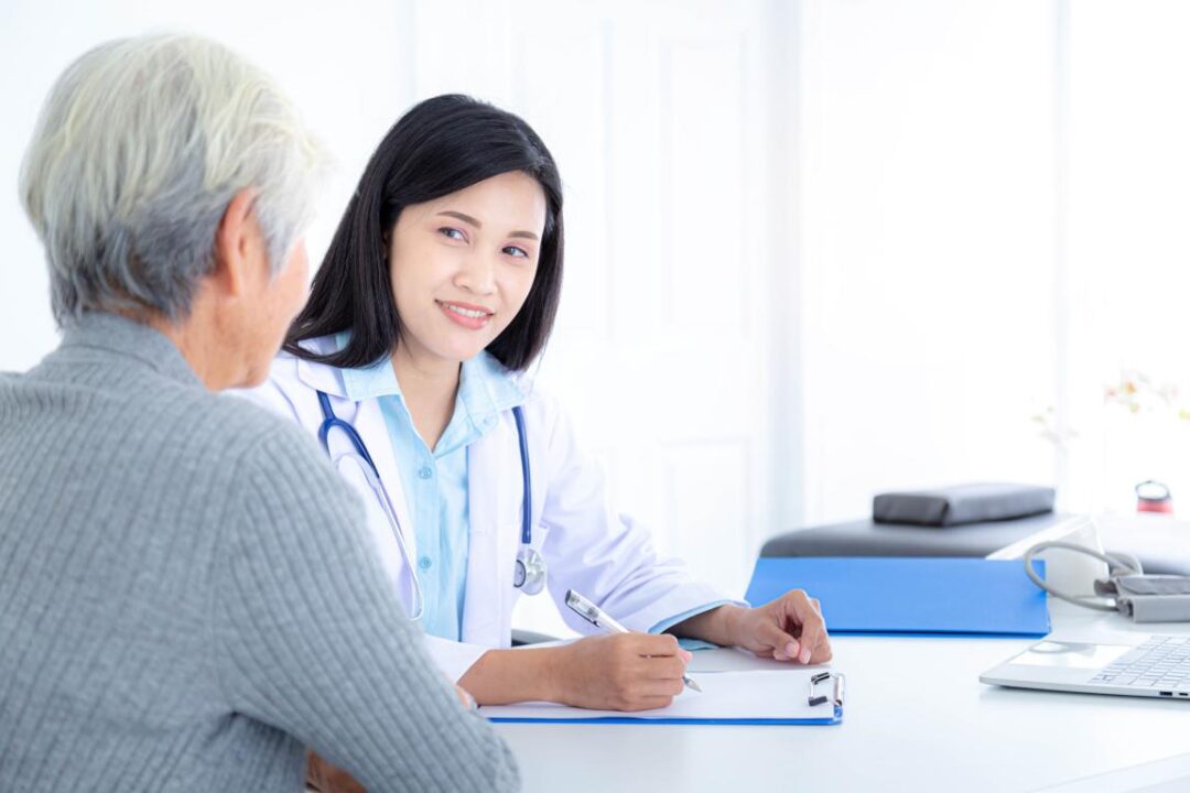 Female Doctor Talking To Elderly Patients In Hospital Celderly Patient Care And Health Care Medical Concept