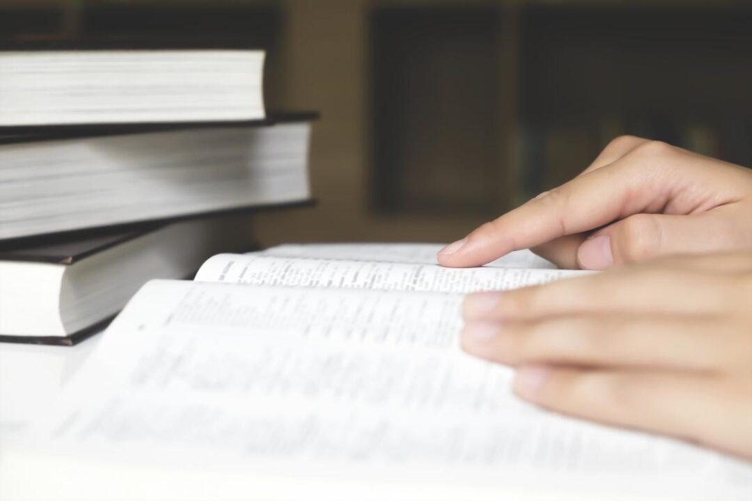Hand Holding Book Reader Paper Information