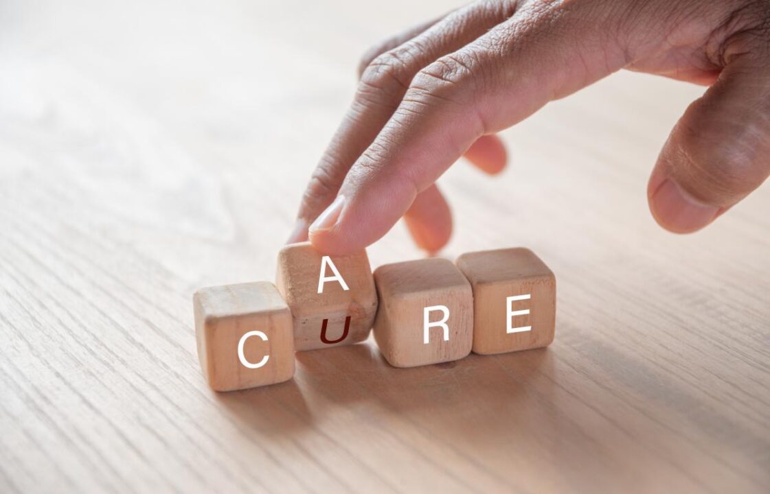 Hand Holding Dice With Text Illustration Care Cure Words