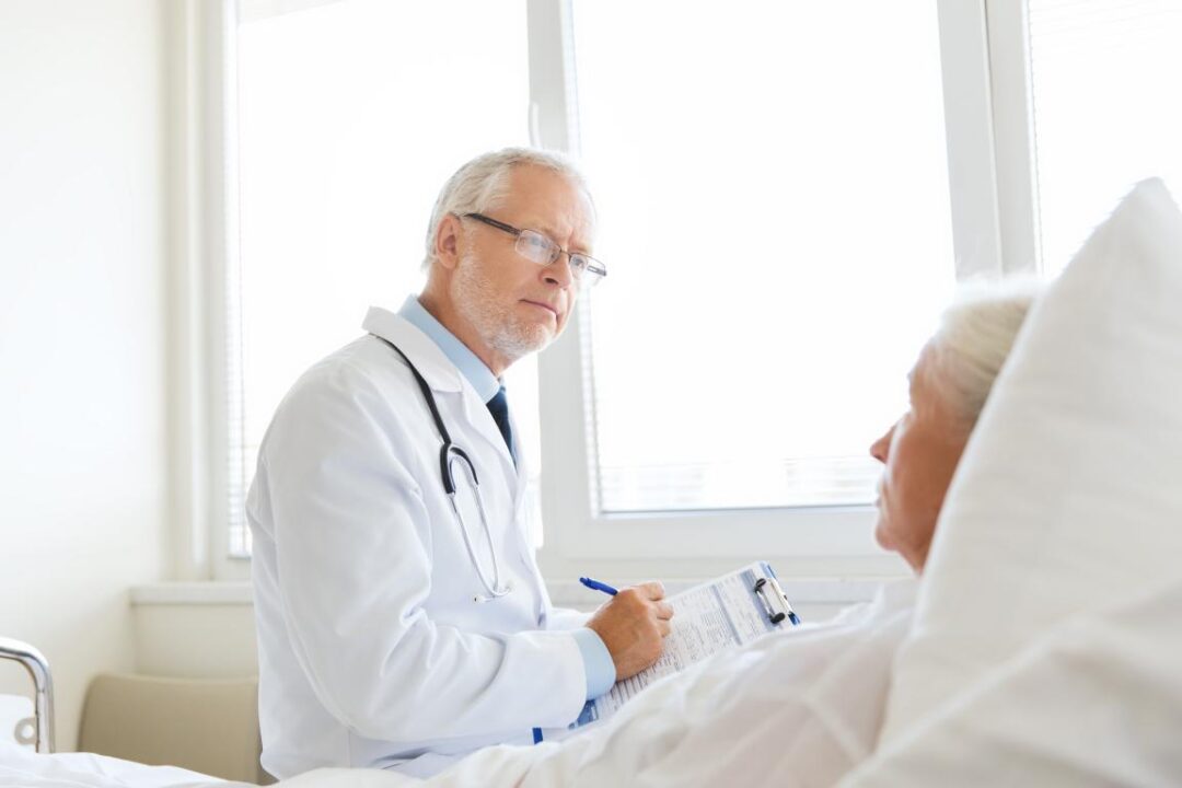 Medicine Age Health Care People Concept Senior Woman Doctor Writing Clipboard Hospital Ward