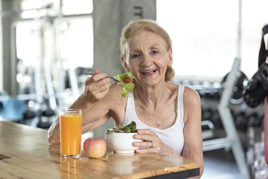 Mini Senior Woman Eating Healthy Salad Orange Juice Elderly Health Lifestyle Concept