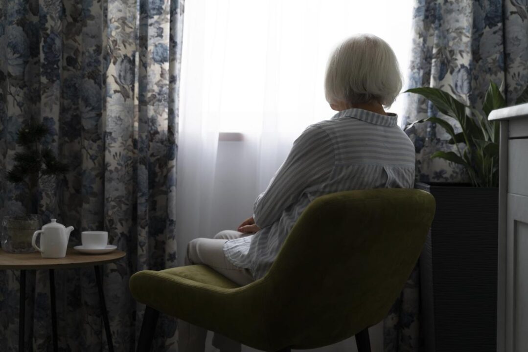 Old Woman Confronting Alzheimer Disease