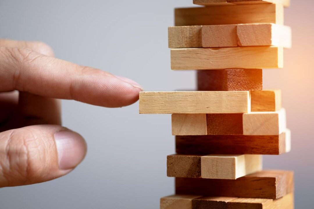Planning Risk Strategy Business Businessman Engineer Gambling Placing Wooden Block Tower 2