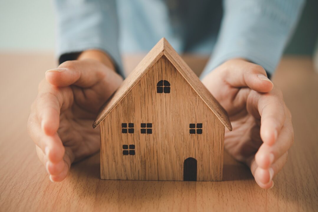 Hand Protecting The Icon House The Concept Of Insurance.