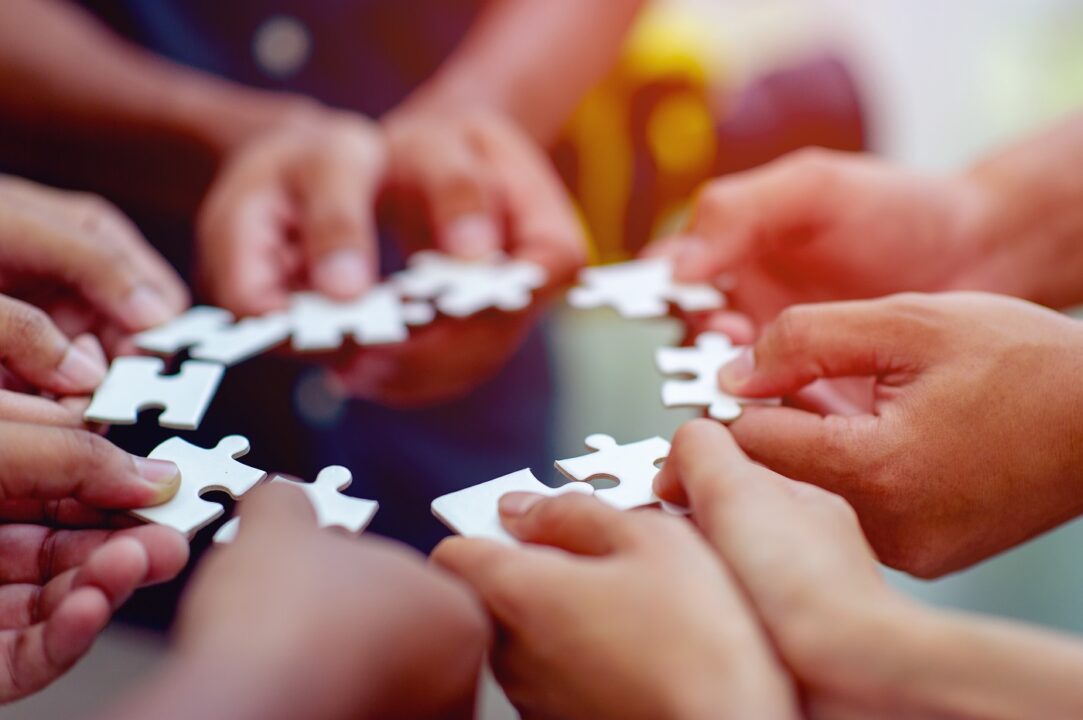 Team Work, Hands And Jig Saw Unite With Power Is A Good Team Of