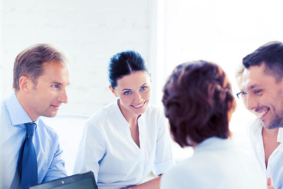 Smiling Businesswoman With Team Meeting Office 2