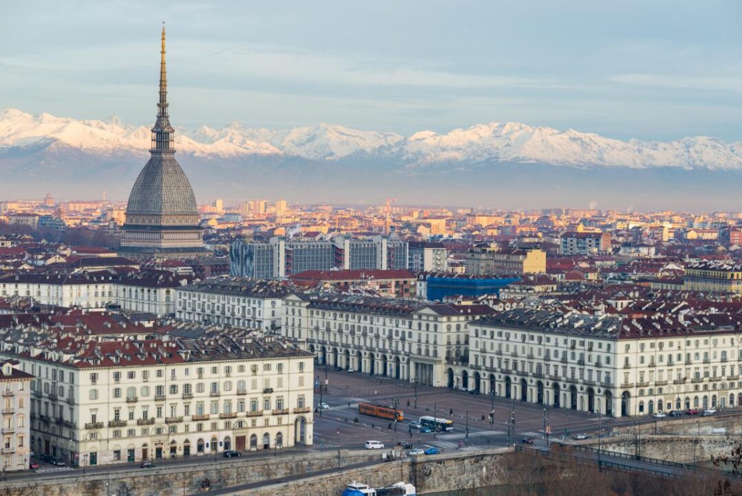 Torino Turin Italy Cityscape At Sunrise With Details Of The Mole Antonelliana Towering Over The City
